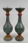 A pair of turned and painted pricket candlesticks, 14½" high