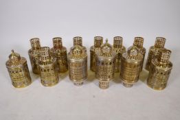 A quantity of pierced brass lanterns purportedly from the set of The Kind and I, largest 11"