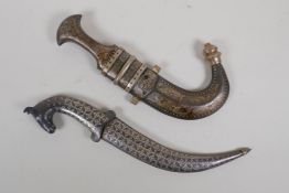 An Eastern niello dagger with a horse head pommel, and a niello Jambiya dagger, longest 14½"