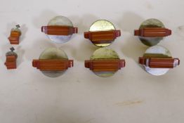 A set of six plus two Art Deco period chrome and bakelite cabinet handles, 3" wide