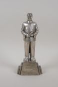 A Chinese white metal figure of Mao, mark to base, 7½" high