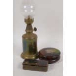 An early C19th tortoiseshell snuff box, 3½" long, a Victorian brass and glass lace makers lamp and a