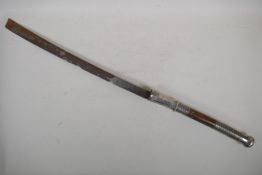 An antique Burmese Kachin Dha (sword) with a white metal and hardwood handle, single edge blade, 33"