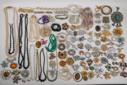 A quantity of good quality vintage costume jewellery to include necklaces, brooches, earrings etc
