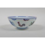 A Doucai porcelain rice bowl with chicken decoration, Chinese Chenghua 6 character mark to base,
