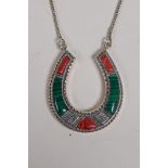A sterling silver horseshoe pendant necklace with agate and malachite panels, 1" drop