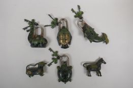 Six Indian bronze padlocks in the form of animals and a Buddha head, largest 7~"