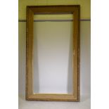 A large Victorian giltwood and composition picture frame, rebate 48" x 97"