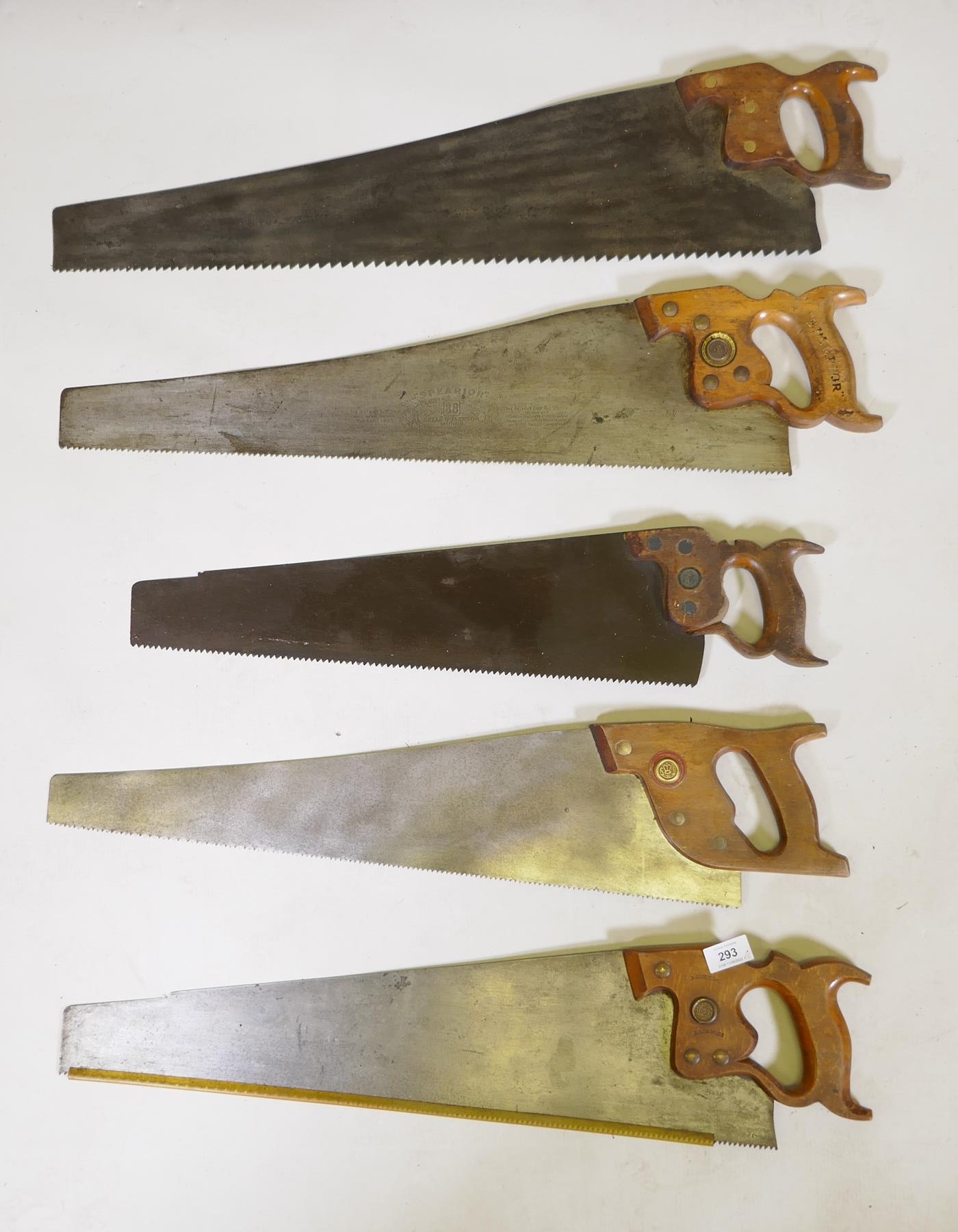 Five vintage Spear & Jackson handsaws with wood handles, largest 30½"