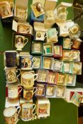 Forty boxed late C20th and early C21st Royal Commemorative mugs to include Aynsley Buckingham