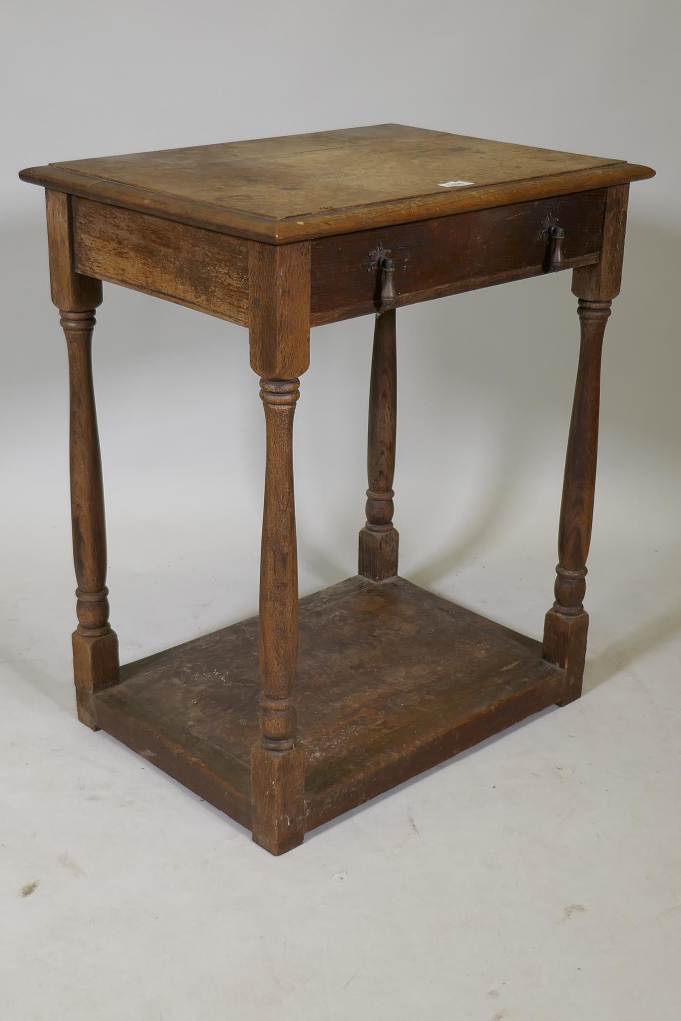 A C19th oak single drawer side table, raised on turned supports with a pot board, 24" x 18" x 29" - Image 3 of 3