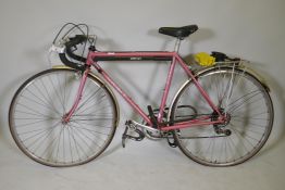 A hand built Orbit Touring bicycle with ten speed Suntor gears, 24" wheels