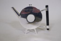 A Christopher Dresser style silver plated tea pot with ebonised wood handle, 6" high