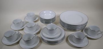 A Royal Worcester 'Classic Platinum' dinner and tea service, eight 10½" plates, five 8" plates,