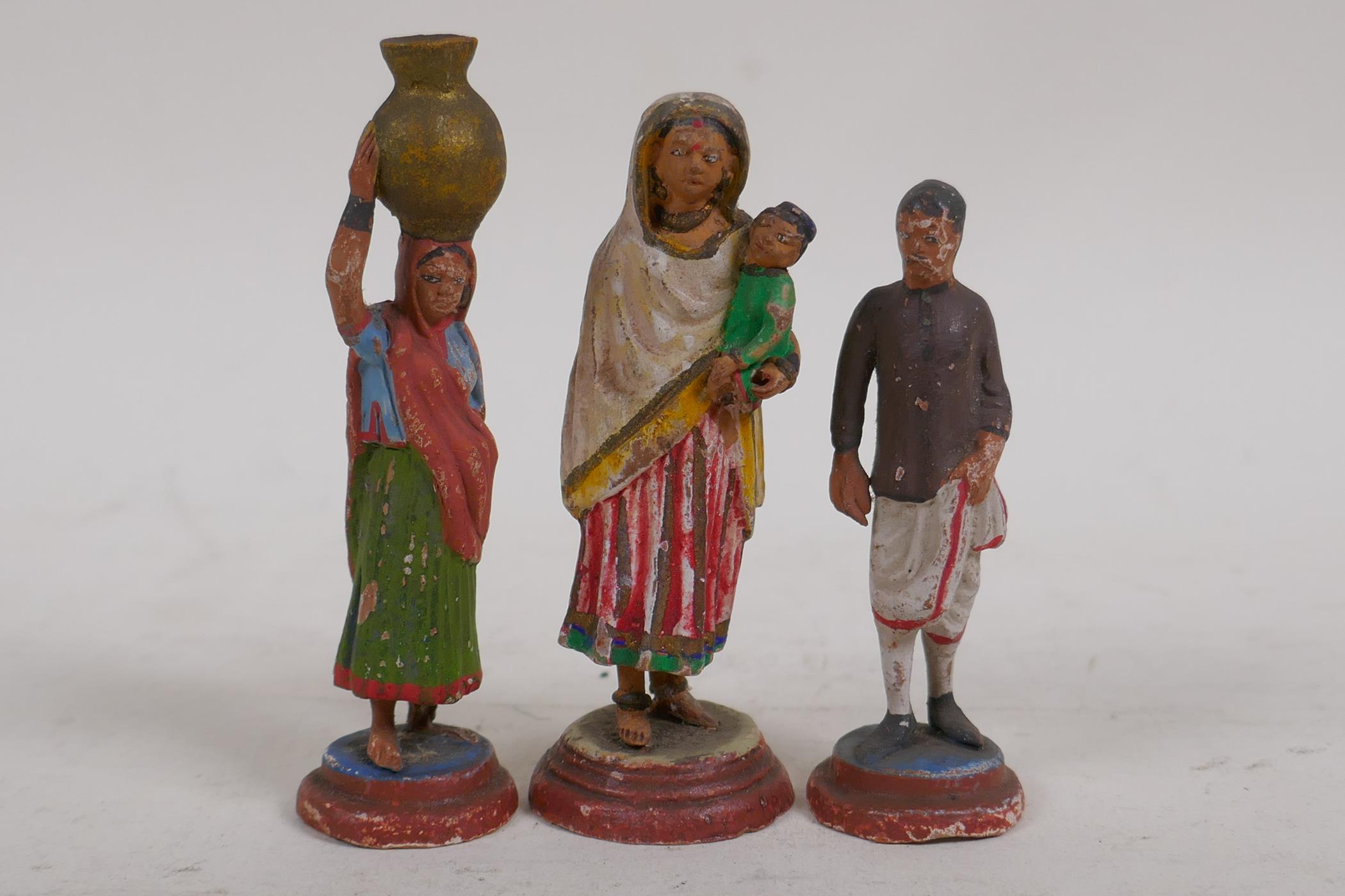 A collection of Indian terracotta figures depicting different trades people, some painted, largest - Image 3 of 5