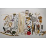 A quantity of costume jewellery and watches