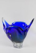 A deep blue studio glass vase of petal form, 8" high