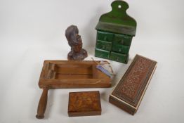 A collection of wooden wares including a vintage football rattle, eastern carved glove box, spice