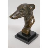 A bronze bust head of a greyhound on a stepped marble base, 9" high