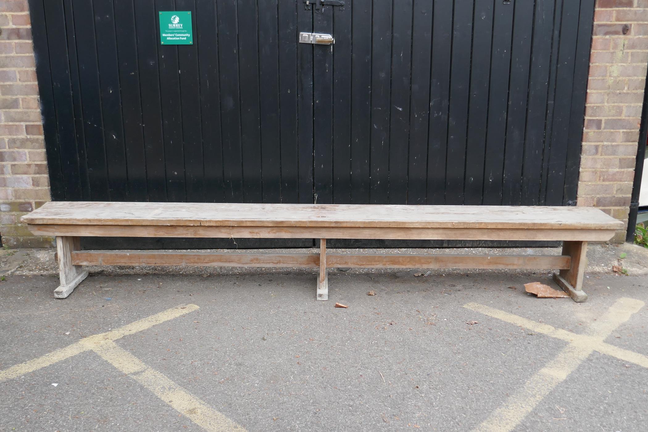 A vintage long pine bench, 120" x 14" x 17"