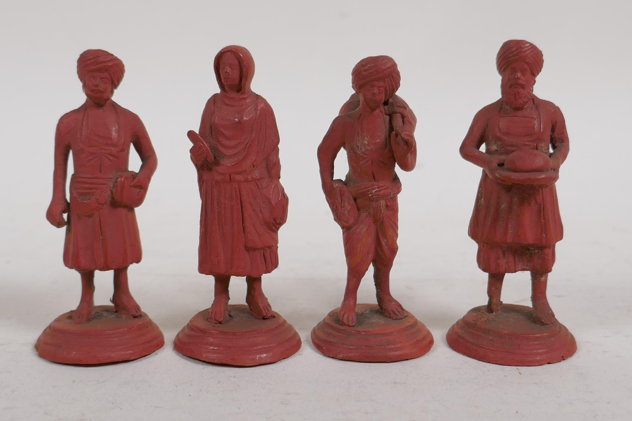 A collection of Indian terracotta figures depicting different trades people, some painted, largest - Image 4 of 5