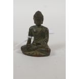 A small Sino Tibetan bronze Buddha, 2" high