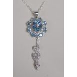 A silver, cubic zirconia and aquamarine set snake style pendant necklace, 2" drop
