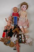 A quantity of small antique and other dolls, largest 16"