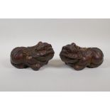 A pair of Chinese filled gilt bronze kylin, 6½" long