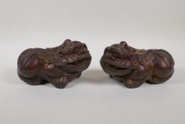 A pair of Chinese filled gilt bronze kylin, 6½" long