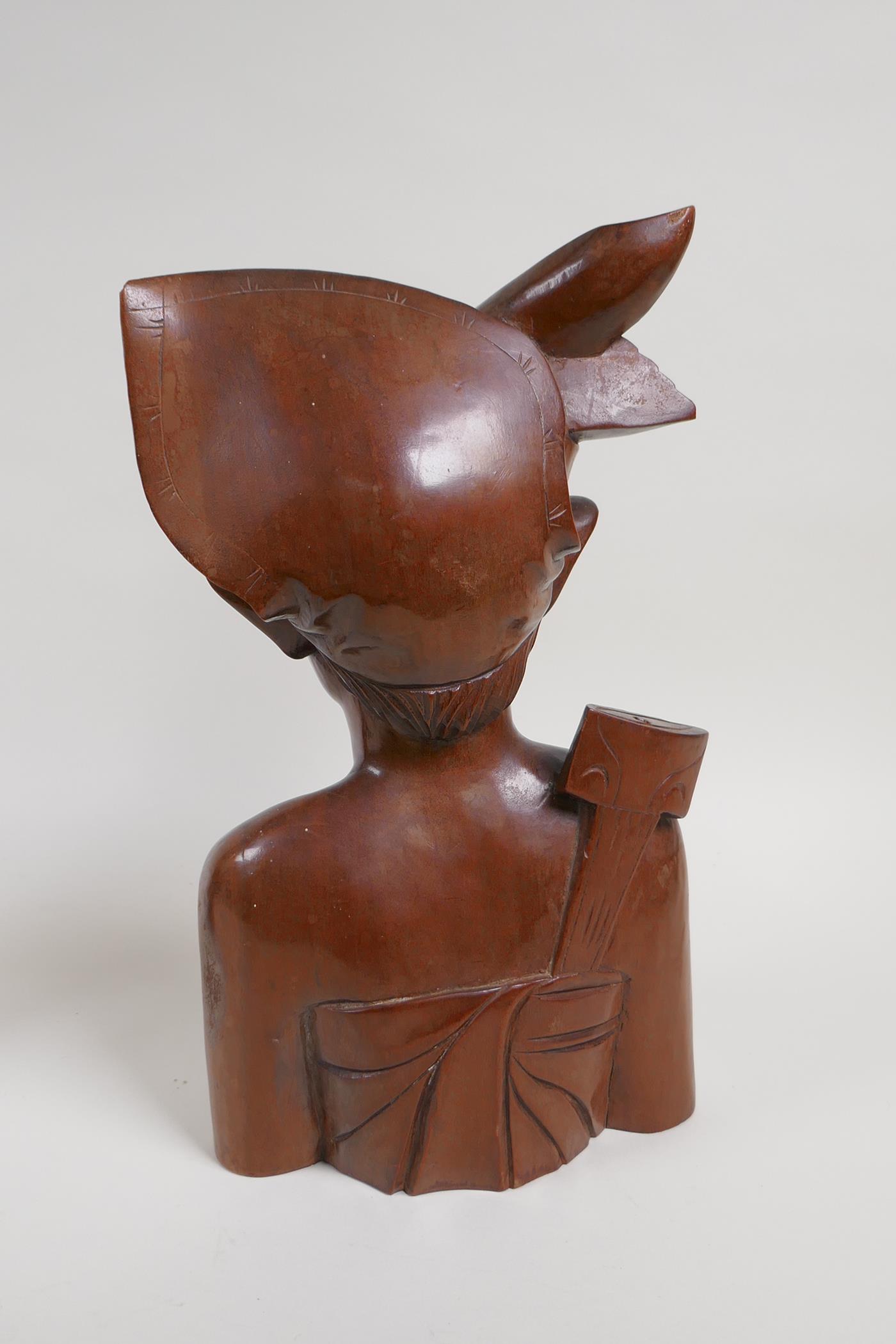A Japanese hardwood carving of a fisherman, and a Balinese hardwood carving of a man in - Image 5 of 6