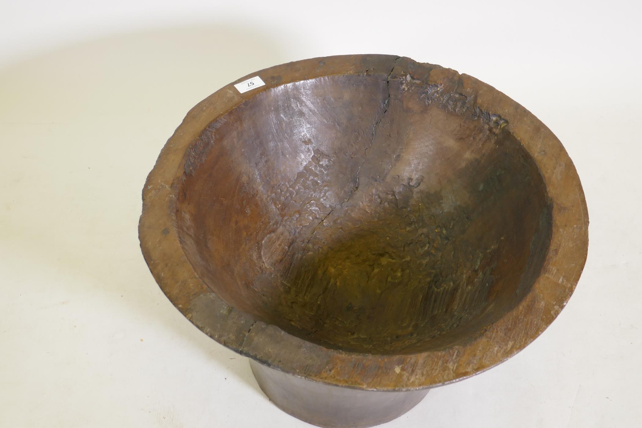 An Indonesian wooden bowl, 12" high, 22" wide - Image 2 of 2