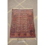 An antique brown ground wool Bokhara rug, 61" x 79"