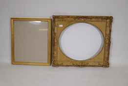 A giltwood and composition picture frame with oval slip and an C18th style frame with glass,