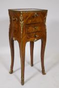 A Louis XV style tulipwood dressing chest with all round inlaid marquetry decoration and ormolu