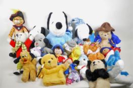 A quantity of named cuddly toys including Snoopy, Woodstock, Paddington, Rupert Bear, Sooty and
