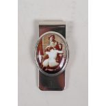 A sterling silver document / money clip set with an erotic pictorial cold enamel plaque, 2" long