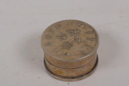 A Chinese pill / ink box decorated calligraphy, 1½" diameter