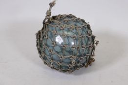 A continental glass fishing float, 12" diameter