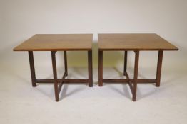 A pair of mid century Danish hardwood occasional / coffee tables by Durup Mobler, manufacturer's