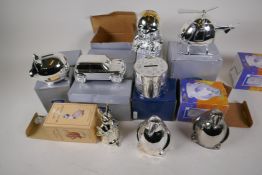 Eighteen silver plated money boxes including a Beatrix Potter figure, cars, helicopters, animals