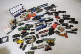 A quantity of Hornby HO and 00 scale engines, track and rolling stock including Dublo type EDL 12