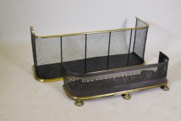 Two brass and steel mesh fire fenders, largest 41" wide, 15" high