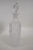 A Whitefriars bark finish clear glass decanter and stopper, 13" high