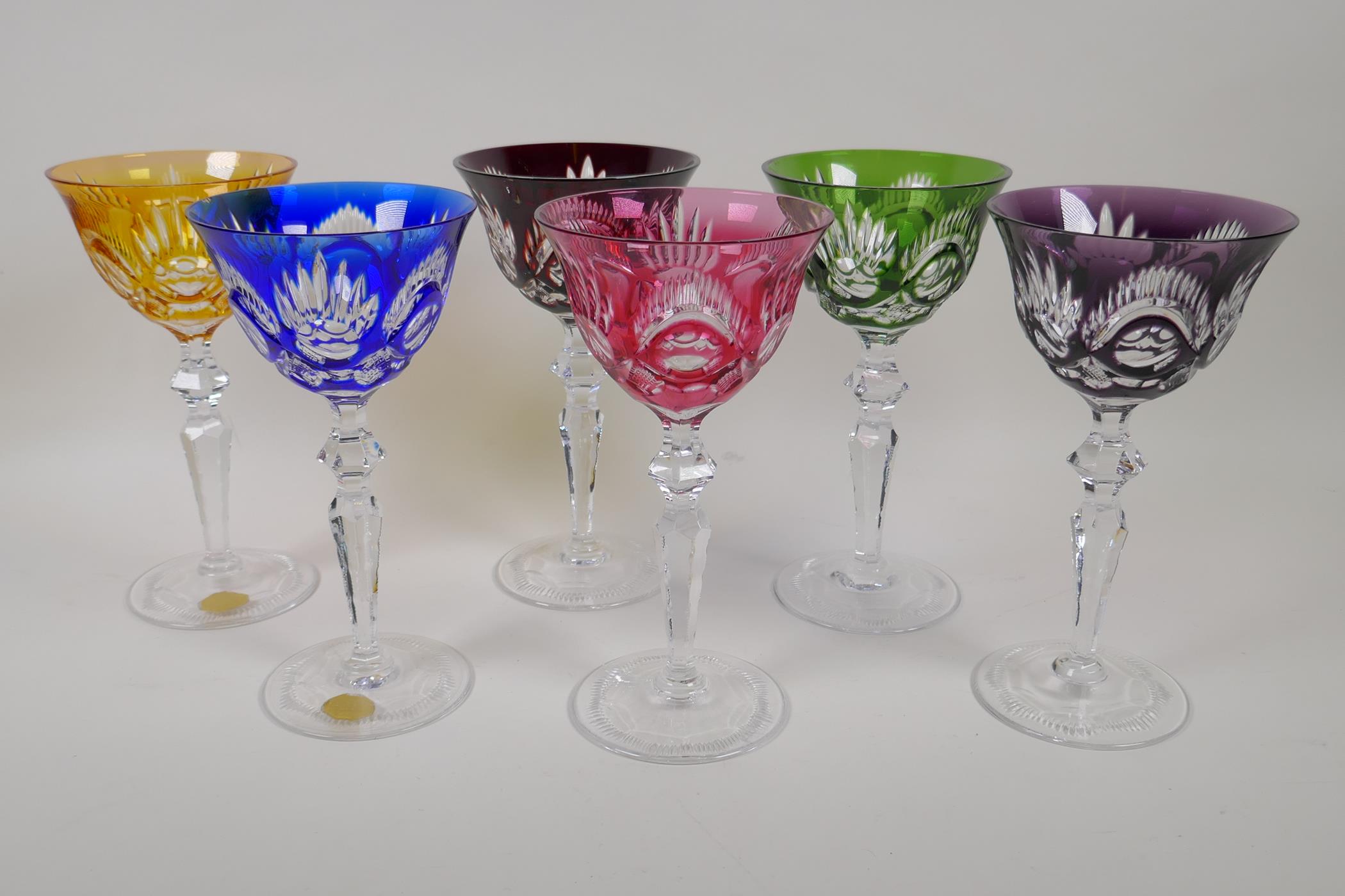 A harlequin set of six Bohemian long stem wine glasses, a/f two glasses rims chipped, 8" high