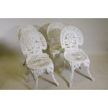 A set of four Coalbrookdale style painted aluminium garden chairs