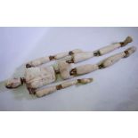 A lifesize stuffed calico dummy with wood joints, requiring re-fixing, 76" long
