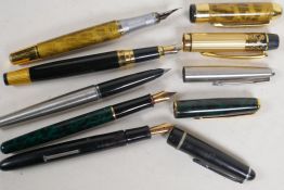 Five various fountain pens to include Parker and Osmiroid