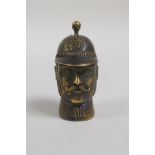 A brass vesta case in the form of a policeman's head bust, 2½"