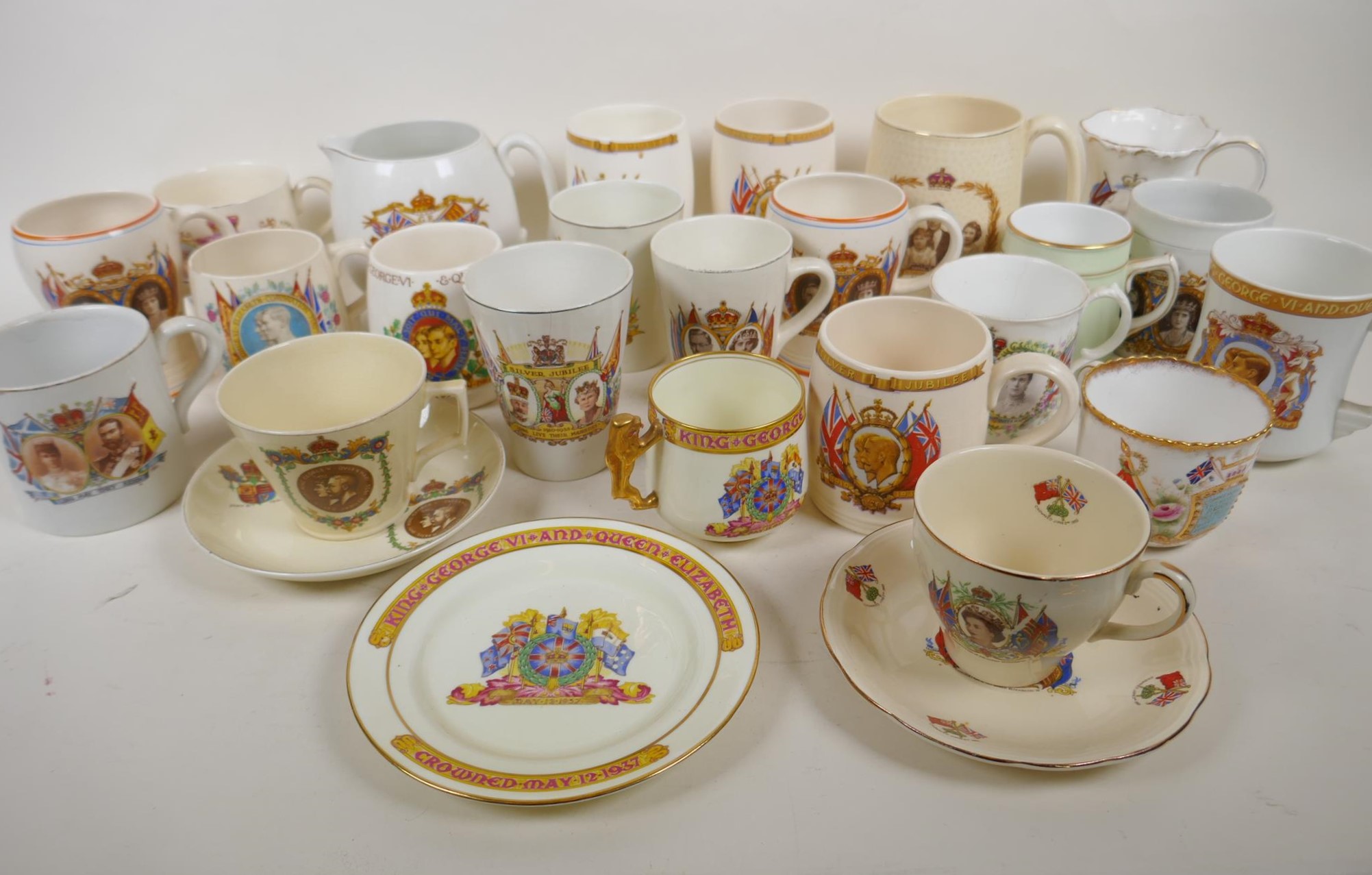 Over twenty four items of early to mid C20th royal commemorative wares, jug, mugs etc